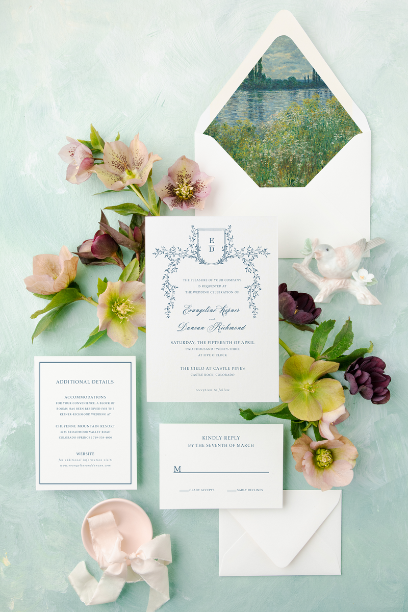 traditional wedding invitation suite with an formal crest, monogram and envelope liner with fine art from Monet