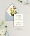 calligraphy wedding invitation in steel blue with a dusty blue envelope and vintage botanical rose envelope liner
