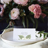 white rose floral escort card or place card