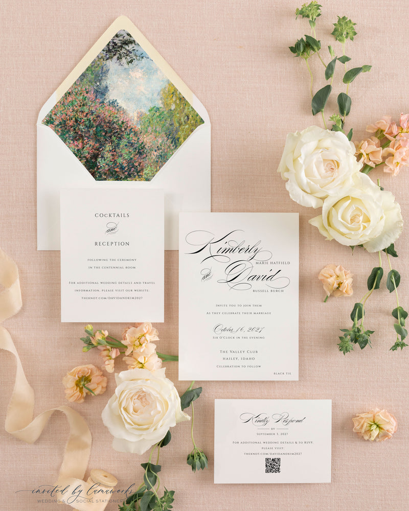 The Kim - Classic Calligraphy suite laid out with its reception card and invitation, styled with roses and ribbon