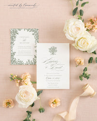 The Kim suite's reception card and wedding invitation shown together, framed by delicate floral vine borders and garden rose styling