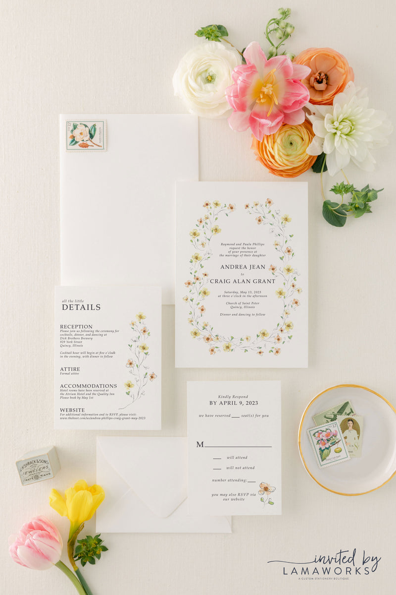 Watercolor floral wreath wedding invitation suite in orange and yellow
