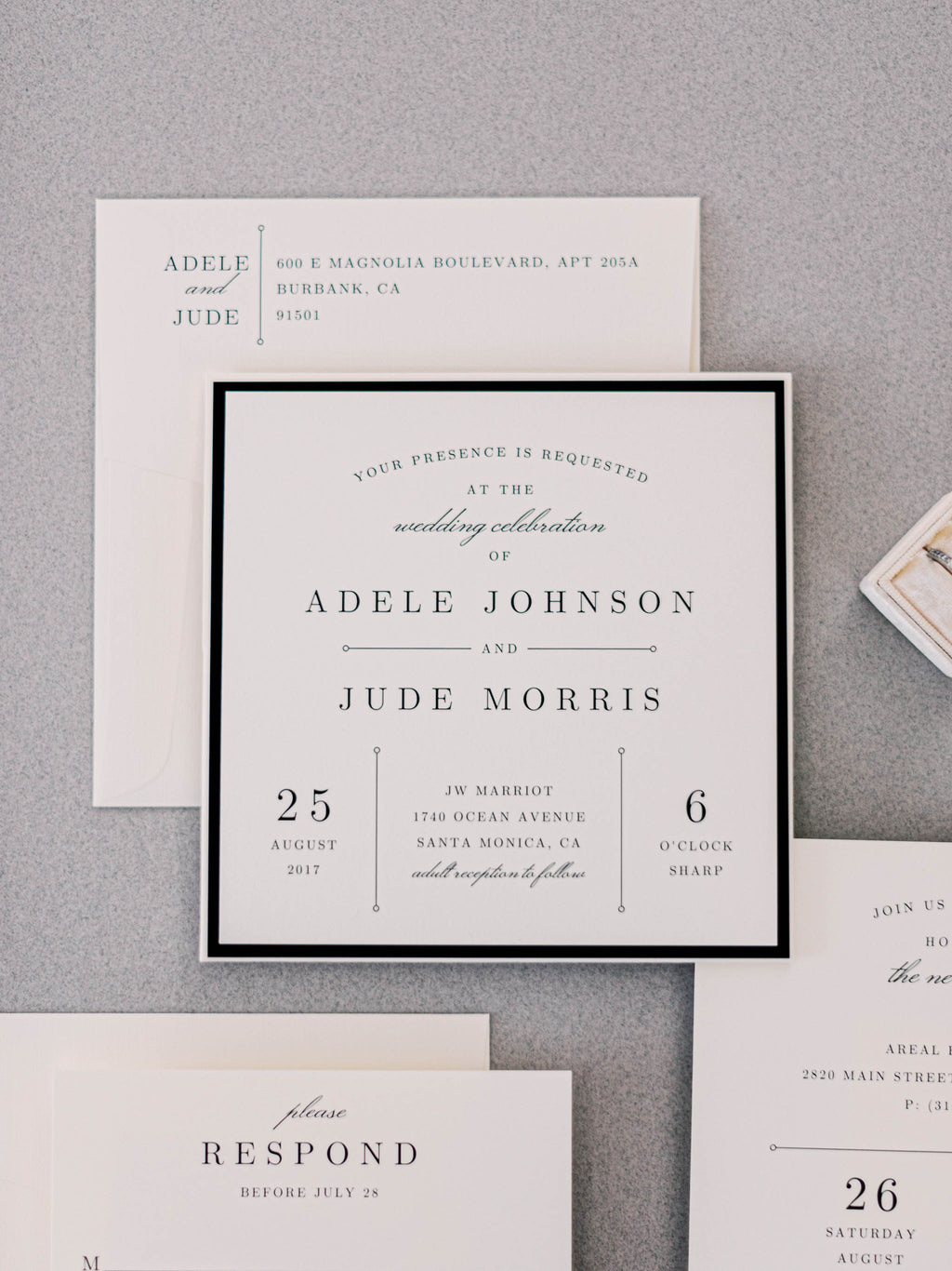 elegant square wedding invitation in black and ivory