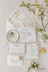 Traditional wedding invitation suite with peach, yellow and pink flowers - invitation, details card, RSVP card and envelope liner.