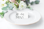 minimalist floral escort card or place card